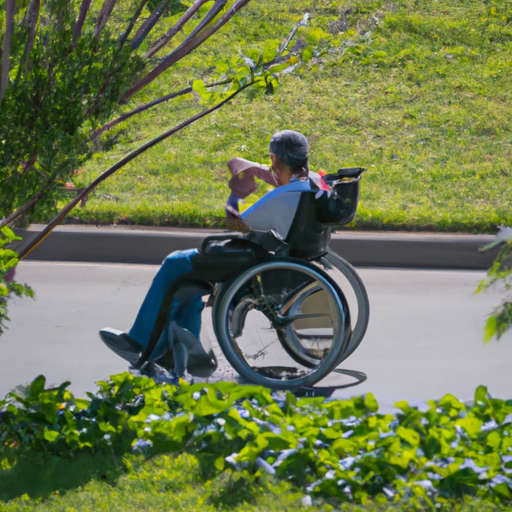 תמונה של נכה מנווט בביטחון בפארק באמצעות כסא גלגלים ממונע